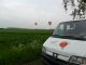 Ballonvaart vanaf oudewater, Snelrewaard over Woerden naar het Woerdens Verlaat. Luchtballon wordt handmatig op parkeerplaats geduwd voor de berging.